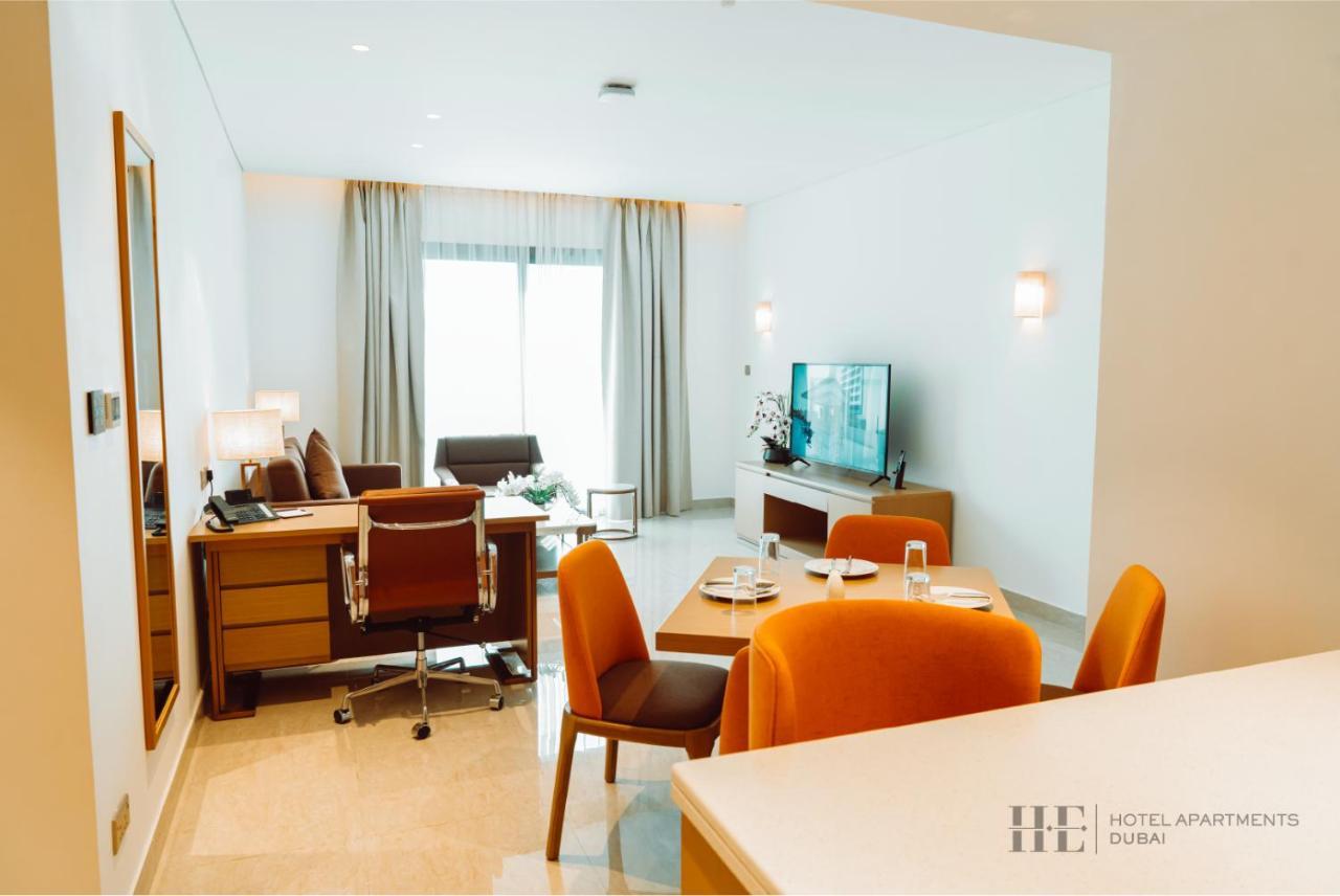 He Hotel Apartments Dubai Room photo A living room at the hotel