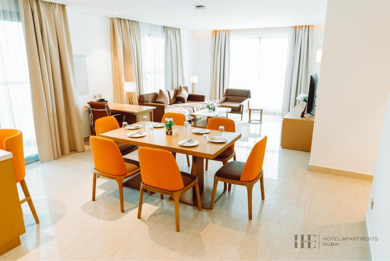 He Hotel Apartments Dubai Room photo A living room at the hotel